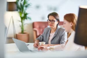 Young woman onboarding a new employee